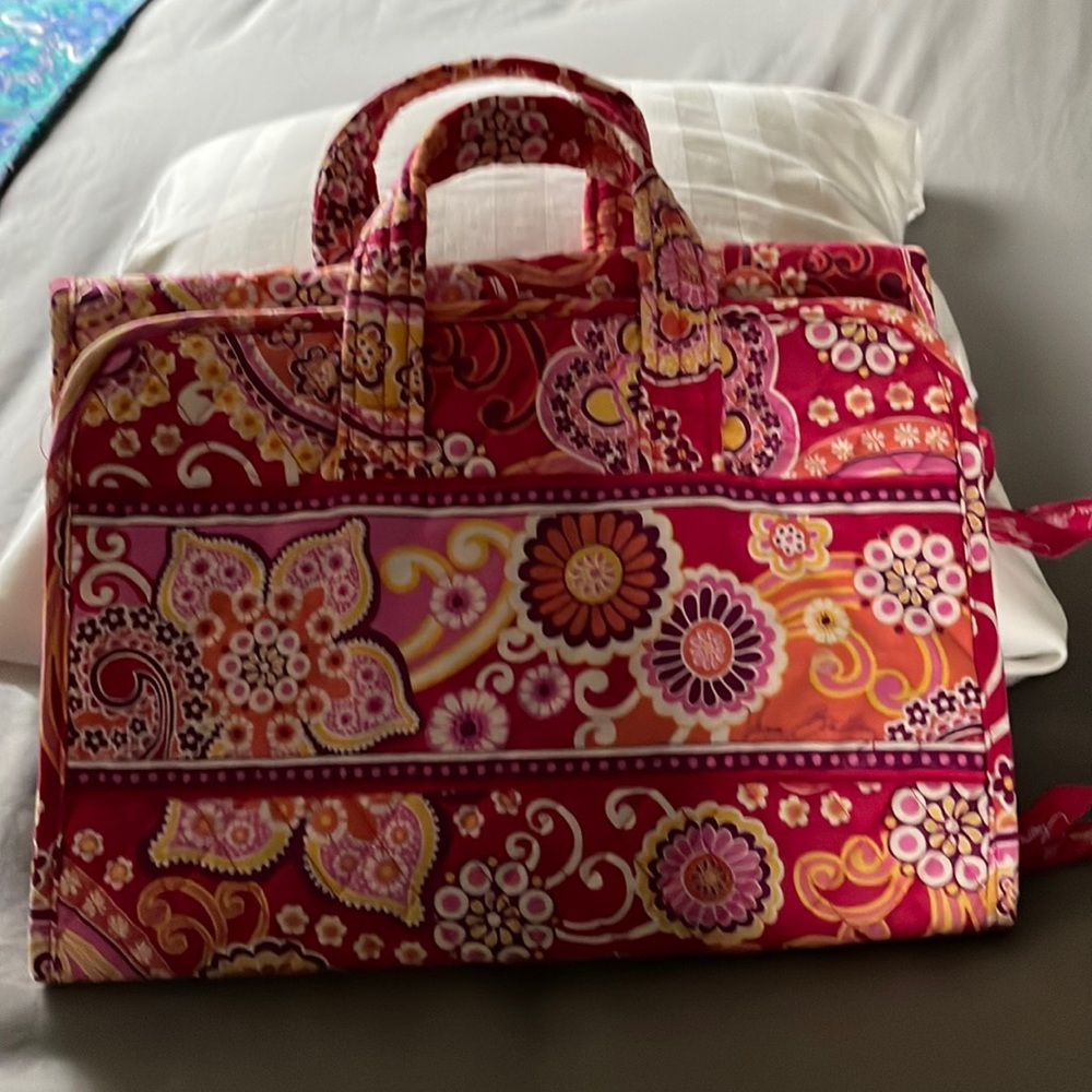 Vera Bradley travel organizer and matching zip bag.
